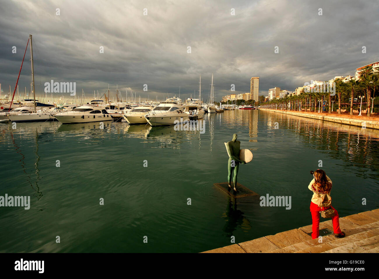 Sculpture by Esperanza d Ors return of Ikarus with a surf wing situated in the port of Alicante. Stock Photo