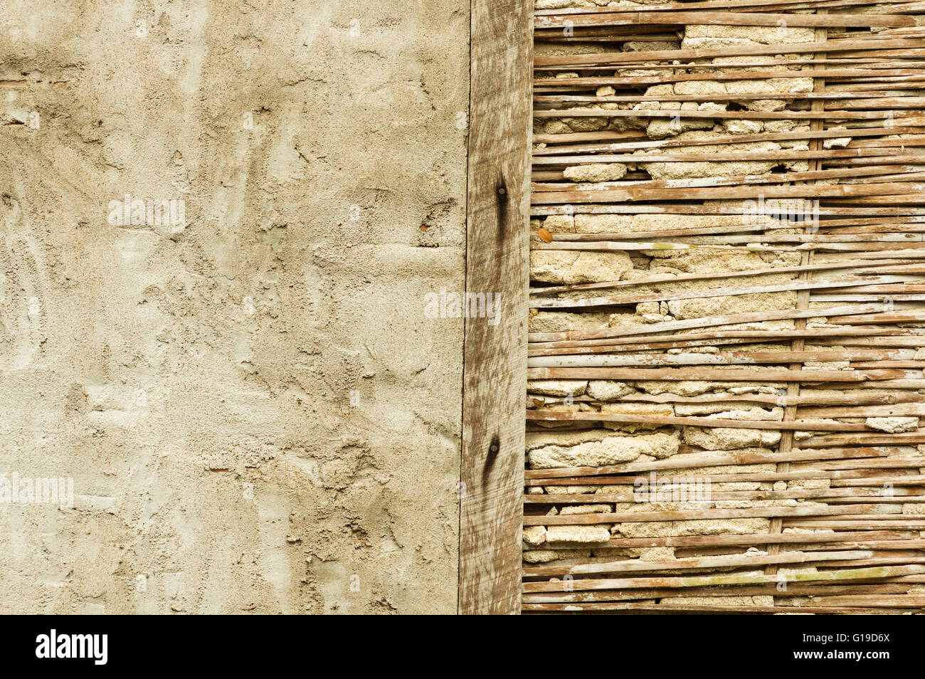 half broken bamboo lath and stucco wall in Thailand Stock Photo