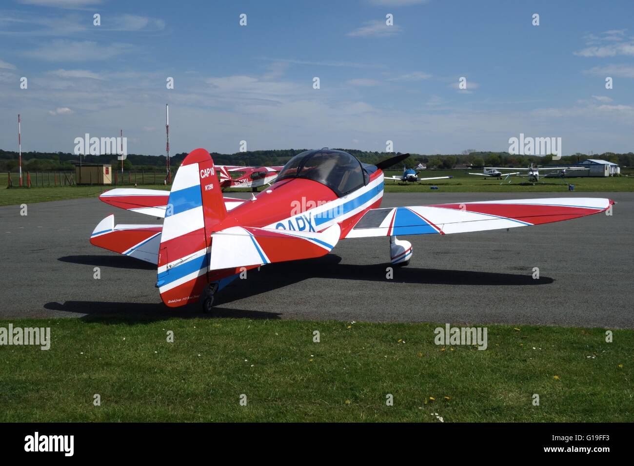 Colourful light aircraft parked at Wolverhampton Halfpenny Green Airfield. UK Stock Photo