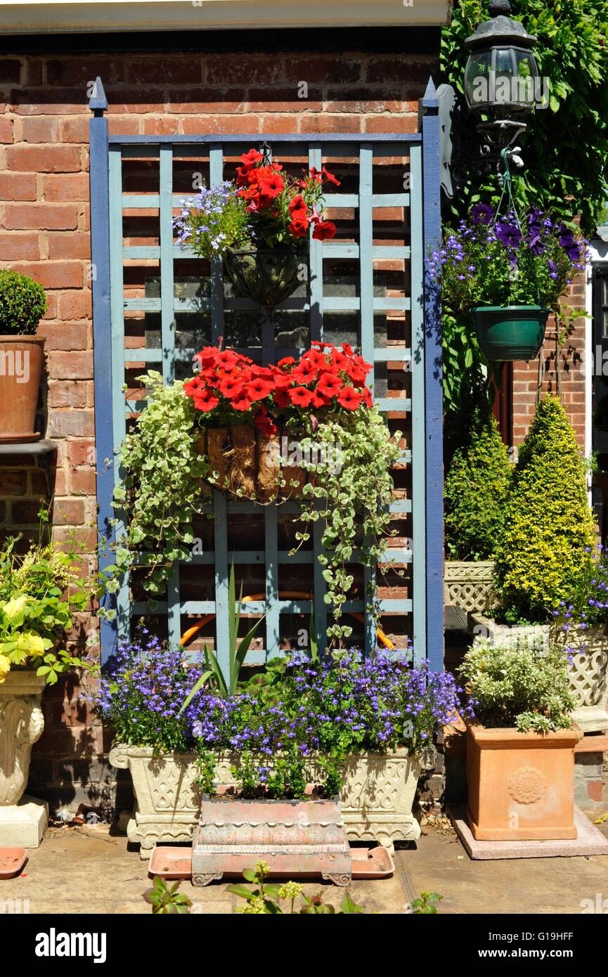 Well designed garden with trellis Stock Photo