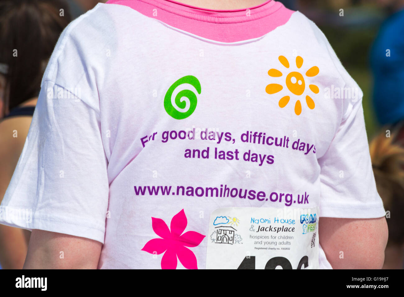 For good days, difficult days and last days - details on back of t-shirt for charity Naomi House children's hospice Stock Photo