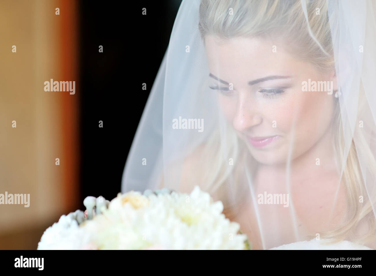 Portrait of a beautiful bride smiling. Stock Photo