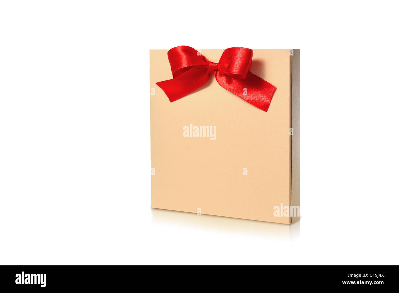 festive gold box with a red bow on a white background Stock Photo - Alamy