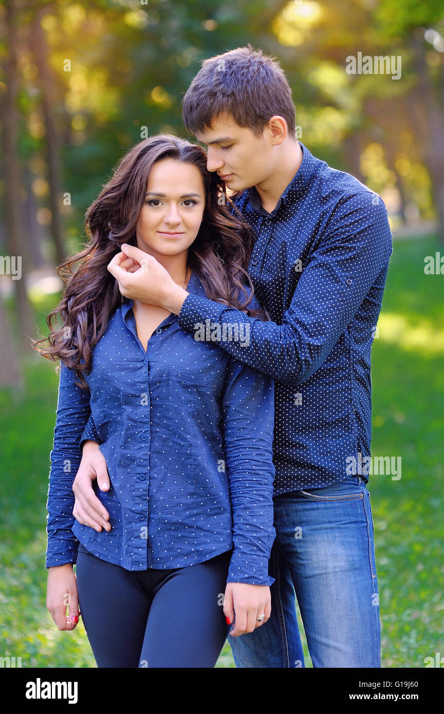 A picture of a young romantic couple in the park Stock Photo - Alamy