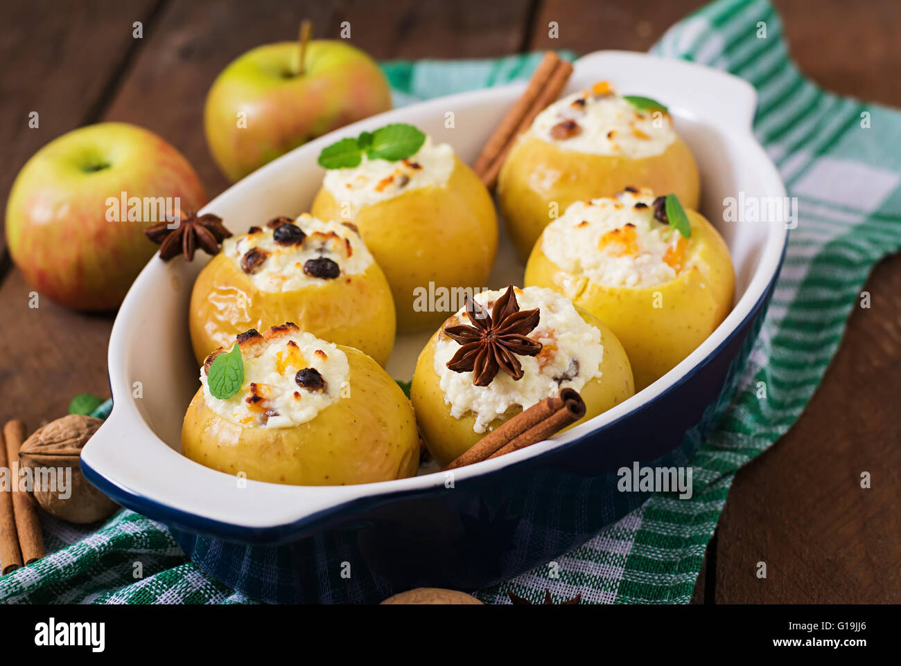 Appetizing Baked Apples With Cottage Cheese And Raisins Stock