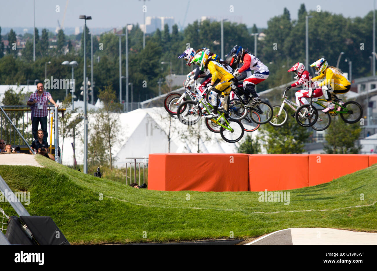 Riders competing in the womens BMX event at London 2012, in mid-air ...