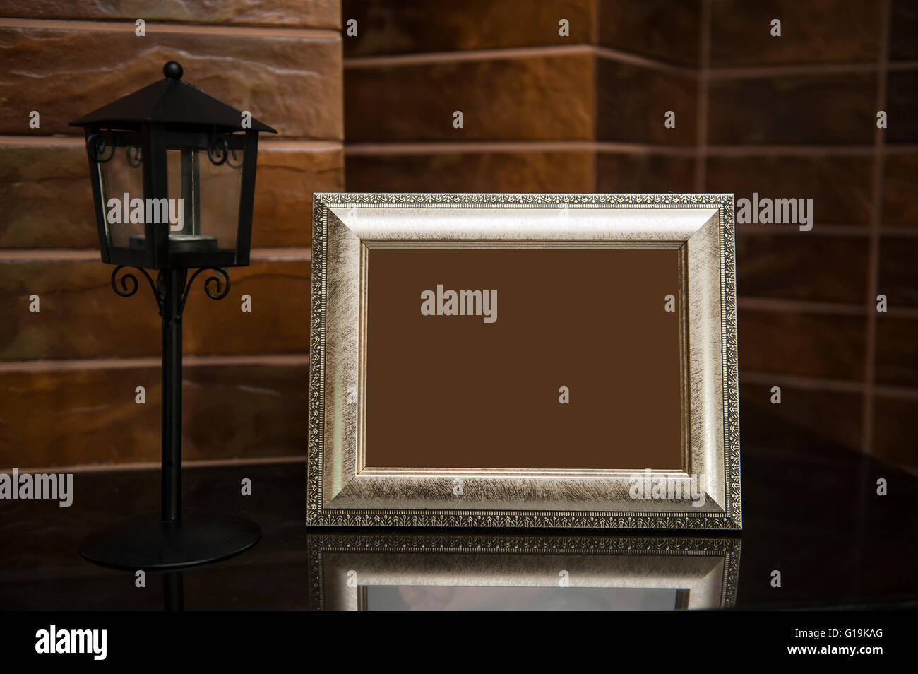 Blank silver picture frame at the desk with clipping path Stock Photo