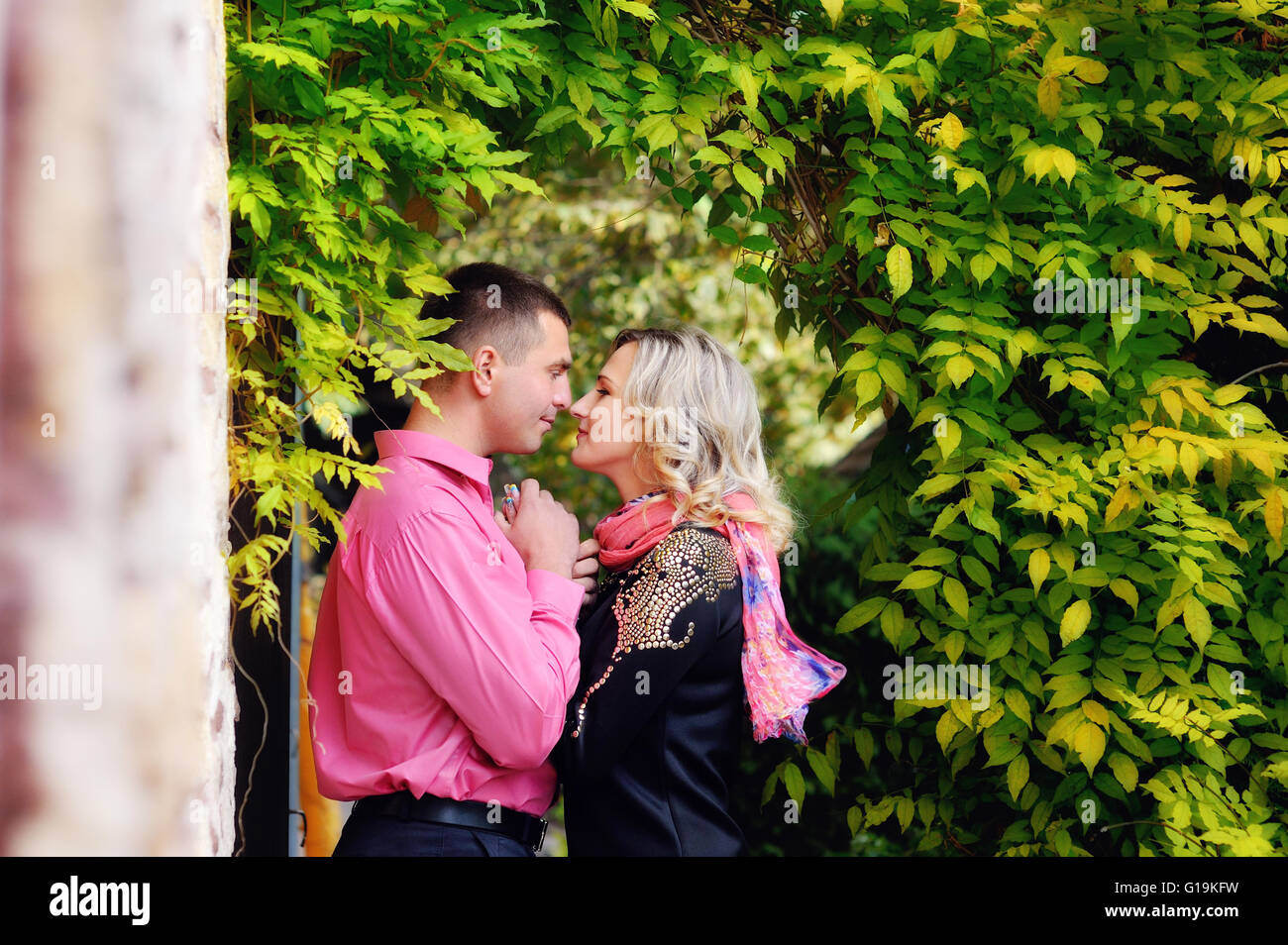 Couple resting in park hi-res stock photography and images - Alamy