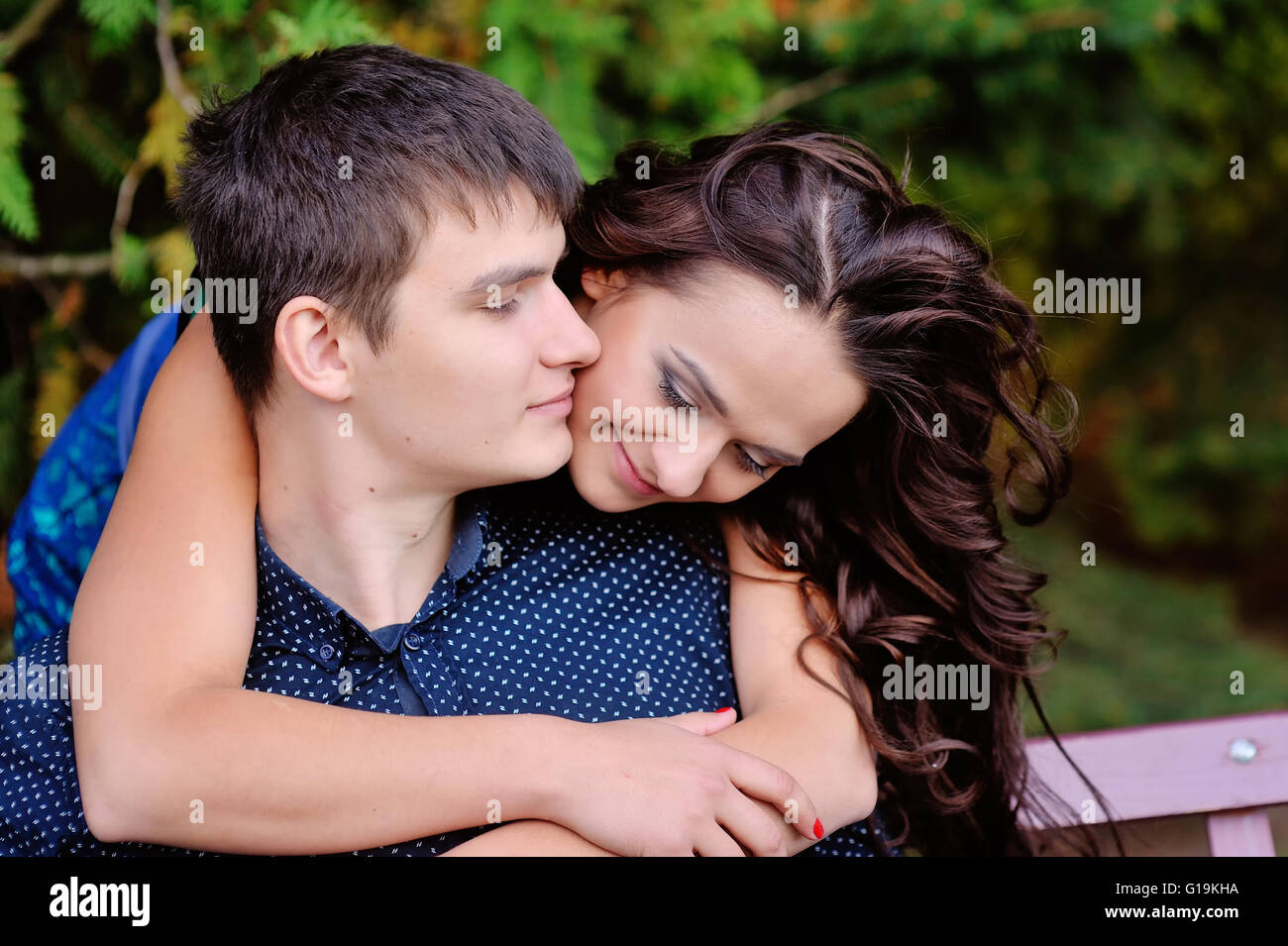 Couple with flower at park. Stock Photo