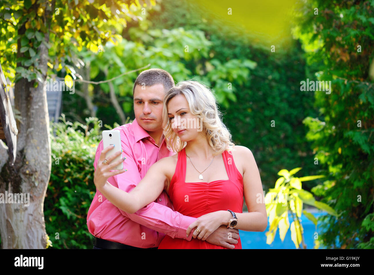 Happy young couple taking a selfie with smart phone Stock Photo
