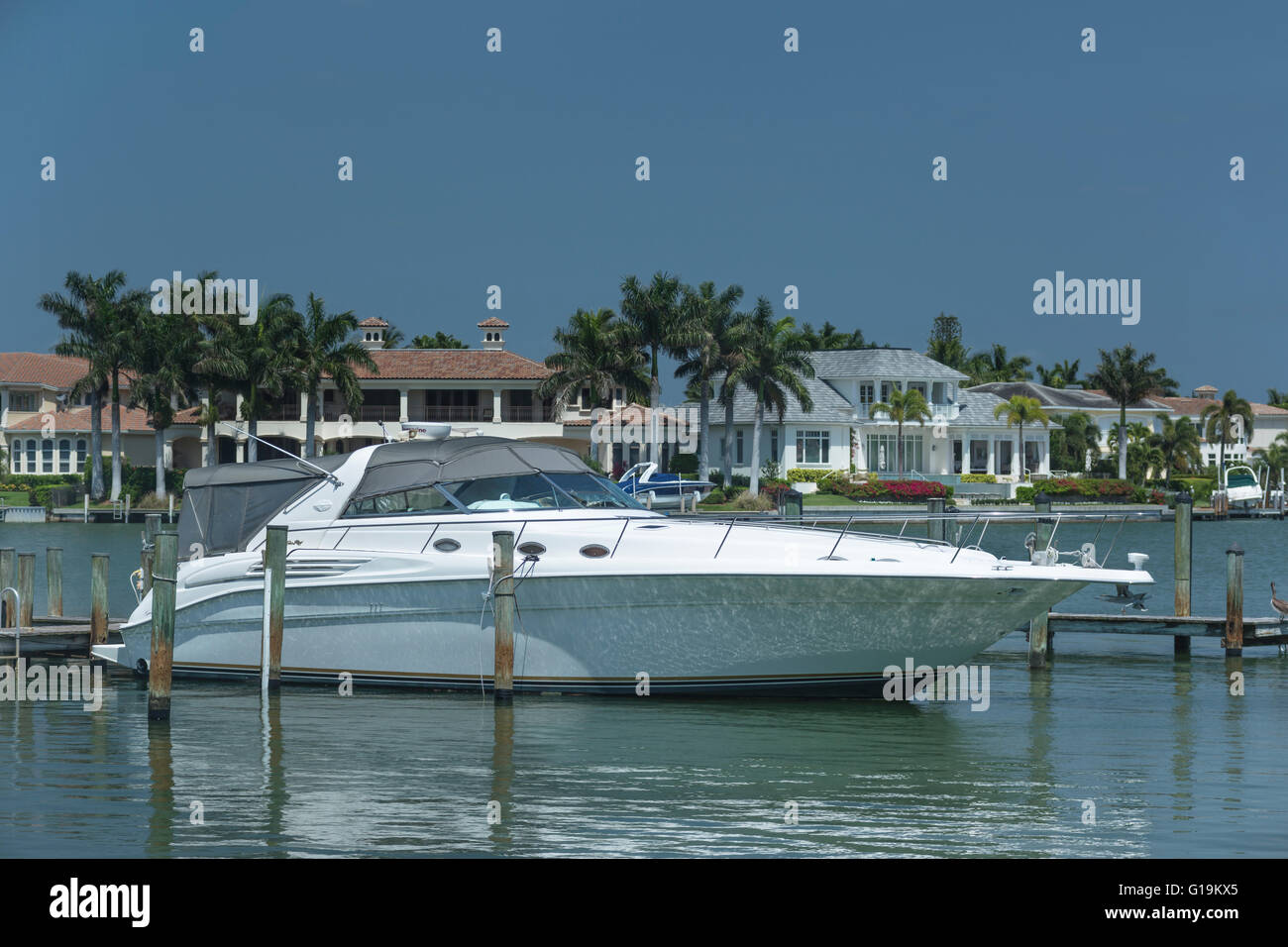 MOTOR YATCH MOORED AT INNER DOCTORS BAY NAPLES FLORIDA USA Stock Photo