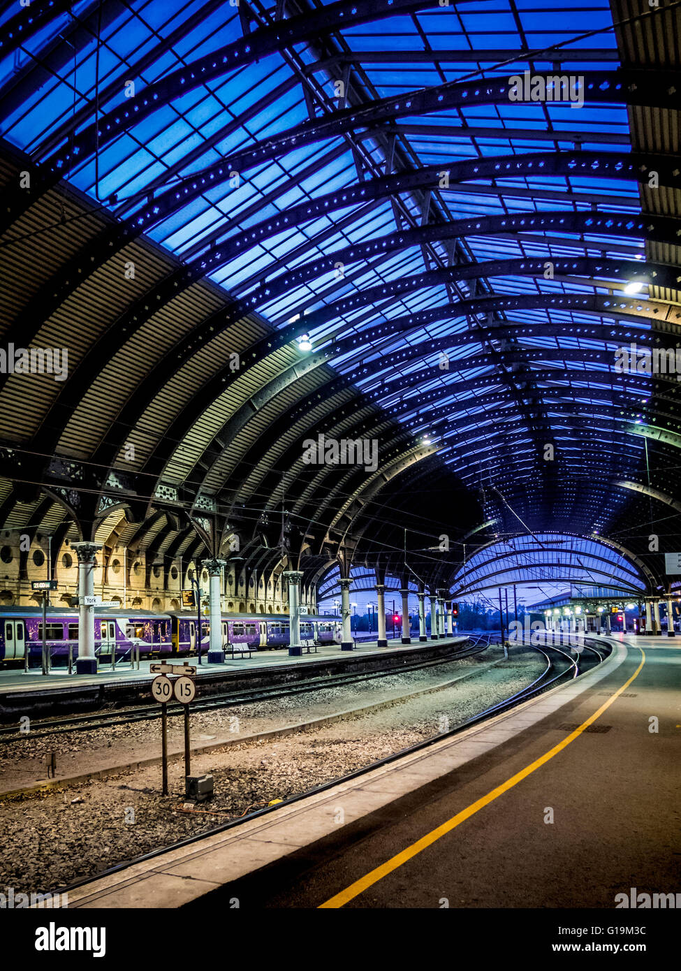 York railway station platform and roof structure at dusk Stock Photo