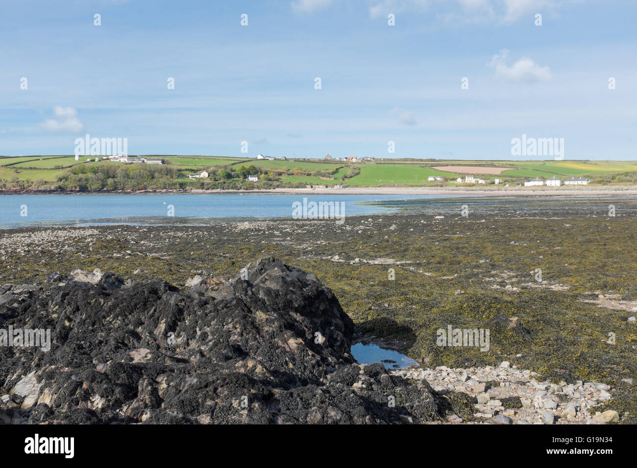 Looking across the water to Dale on the Pembrokeshire Coastal Path Stock Photo