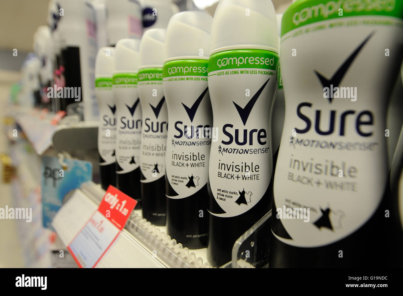 Sure Deodorant on display in Boots Chemist Stock Photo - Alamy