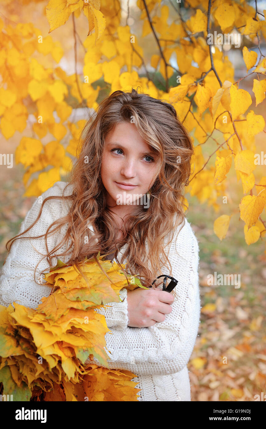 Young woman in beautiful autumn park, concept autumn Stock Photo
