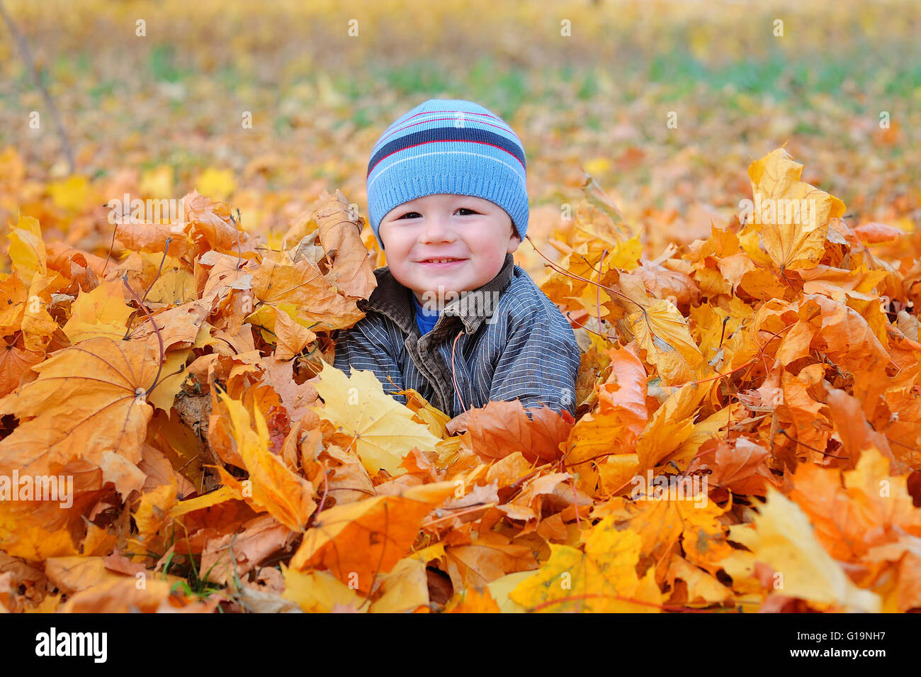 autumn boy portrait shoot in the garden Stock Photo