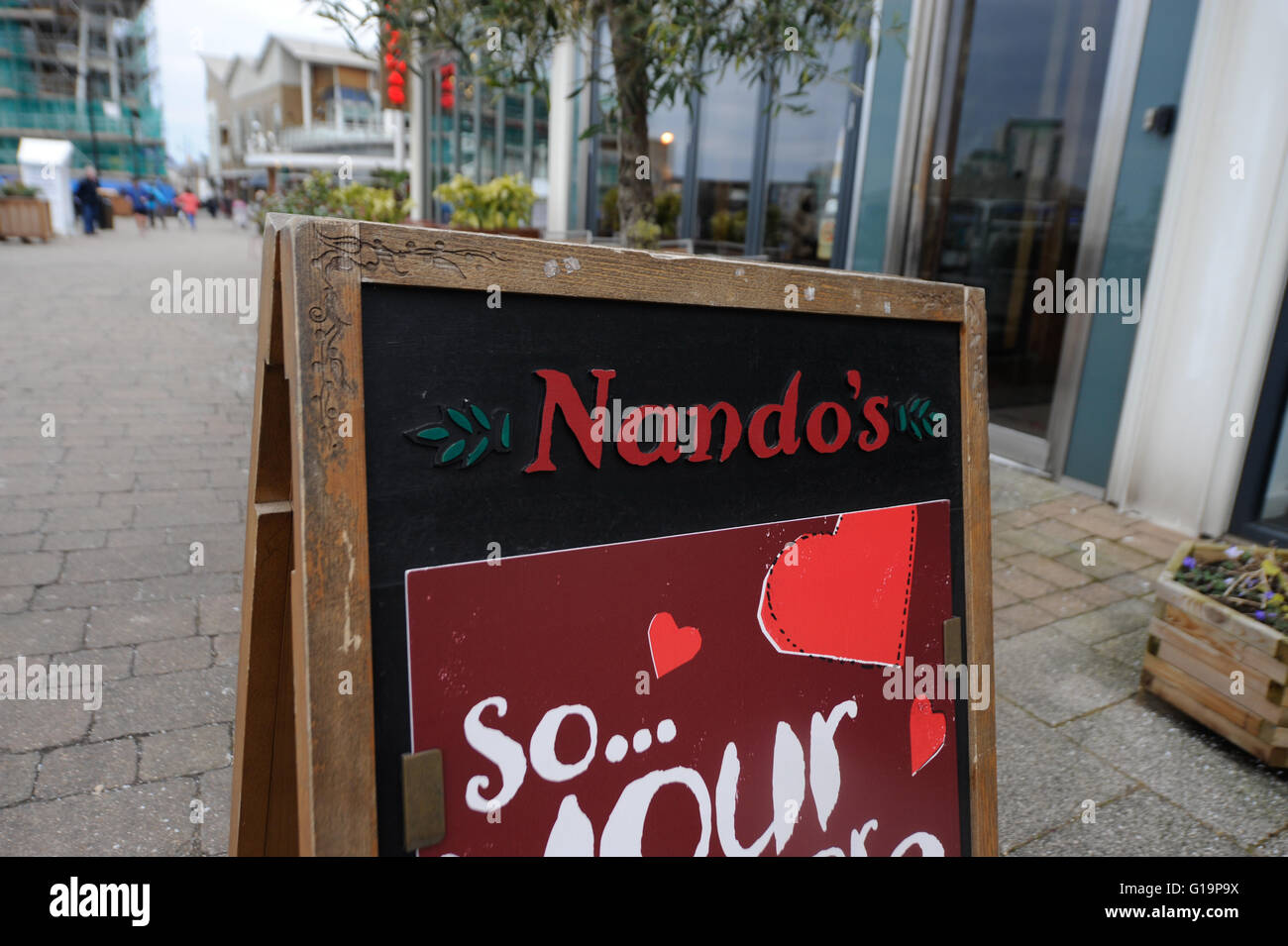 Nando's sign in Cardiff Bay - United Kingdom Stock Photo
