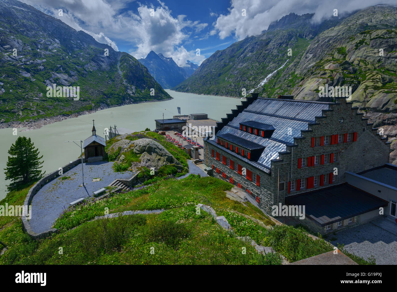 Great view from the top of the Grimsel pass over the Grimselsee hotel and dam. Switzerland, Bernese Alps, Europe. Stock Photo