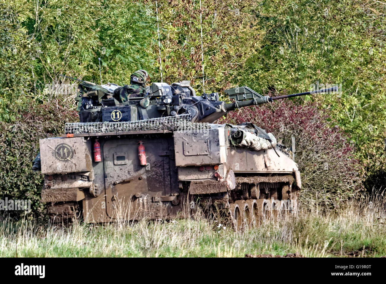 A British Army Warrior Infantry Fighting Vehicle, MCV-80, on the Salisbury Plain military Training Area in Wiltshire, UK. Stock Photo