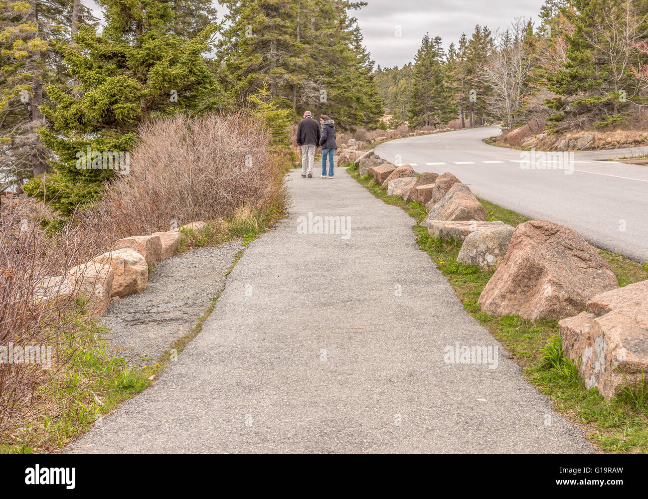A couple taking an afternoon scenic walk in Acadia National Park, Bar Harbor, ME. Stock Photo