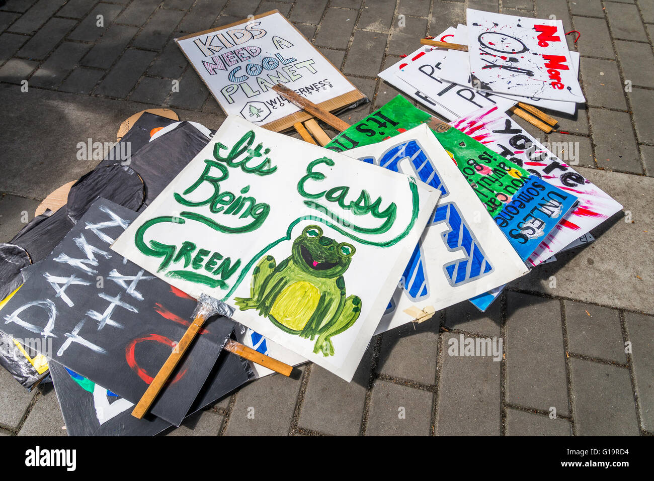 Pile of environmental protest signs, ready for Earth Day. Stock Photo