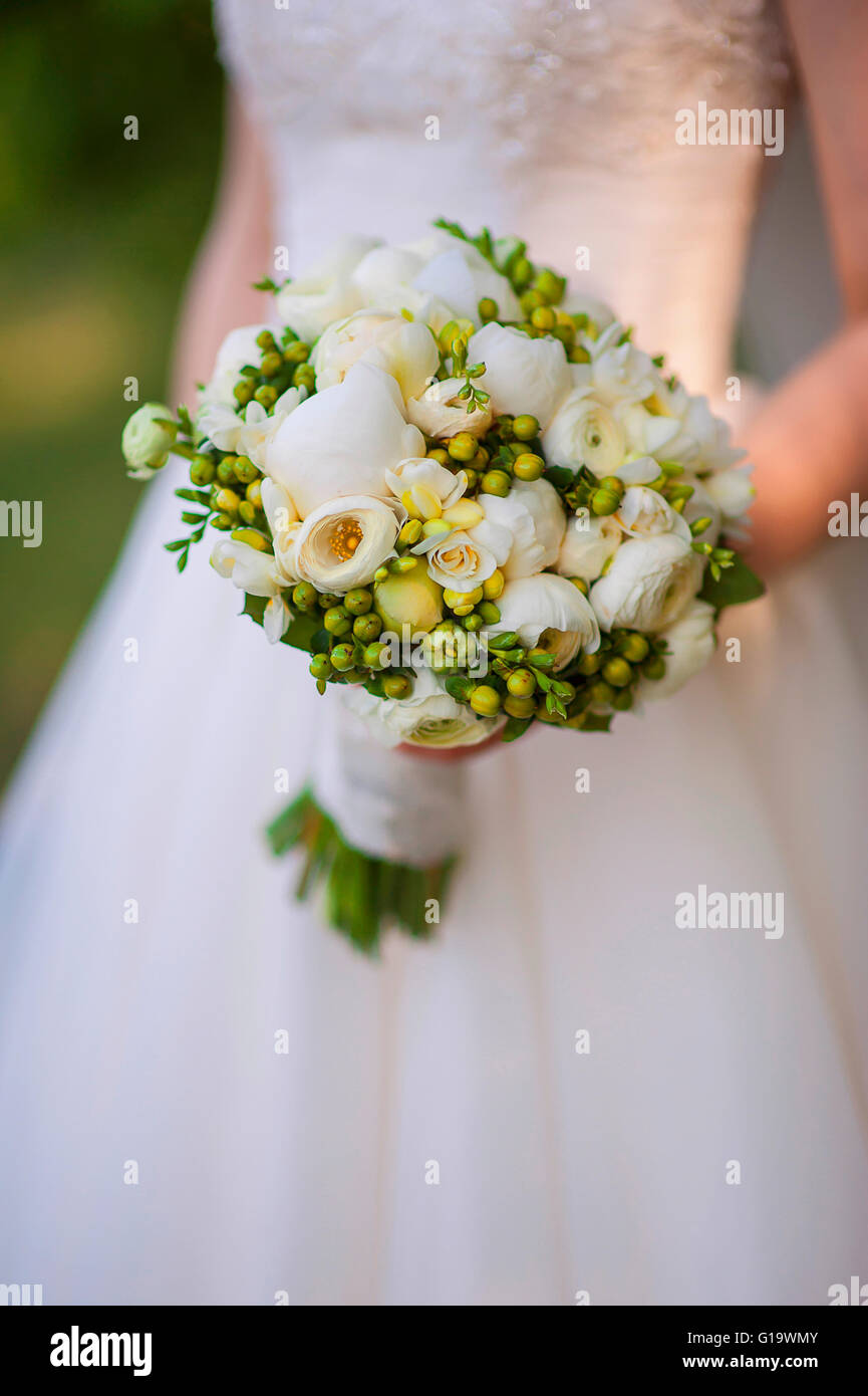 Beautiful wedding bouquet in bride's hand Stock Photo