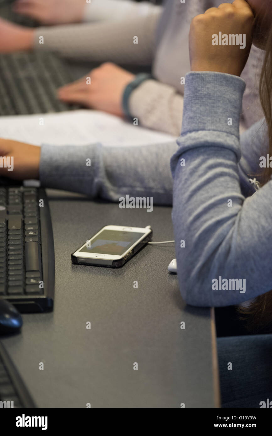 Computers in an ICT lesson in a UK comprehensive school classroom Stock Photo