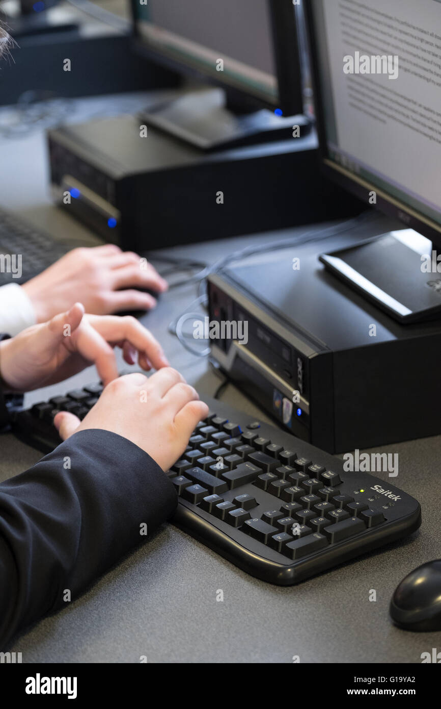 Computers in an ICT lesson in a UK comprehensive school classroom Stock Photo
