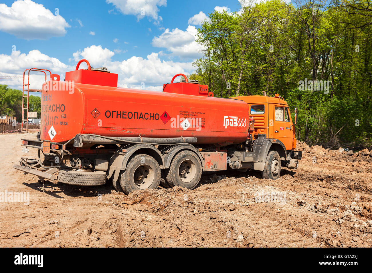 Gasoline tanker truck at the construction site under construction of new road Stock Photo