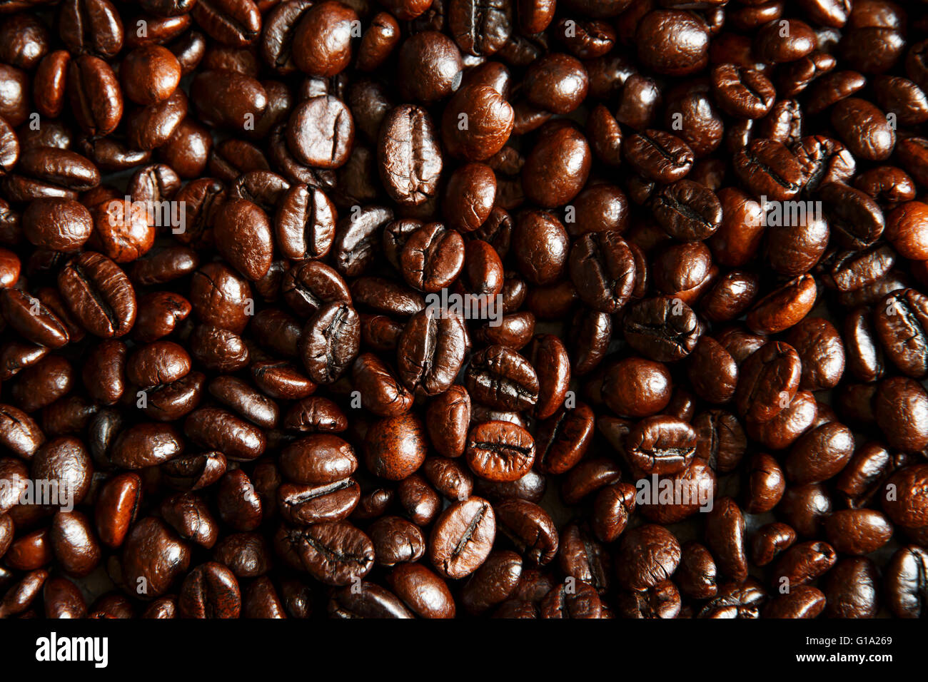 Roasted Coffee Beans background texture Stock Photo - Alamy