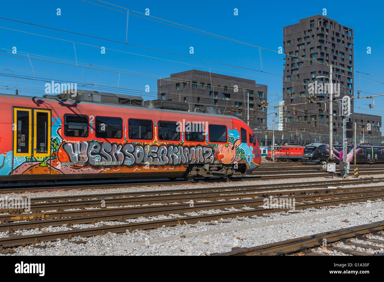 Graffiti covered train near the railway station in Ljubljana, Slovenia Stock Photo