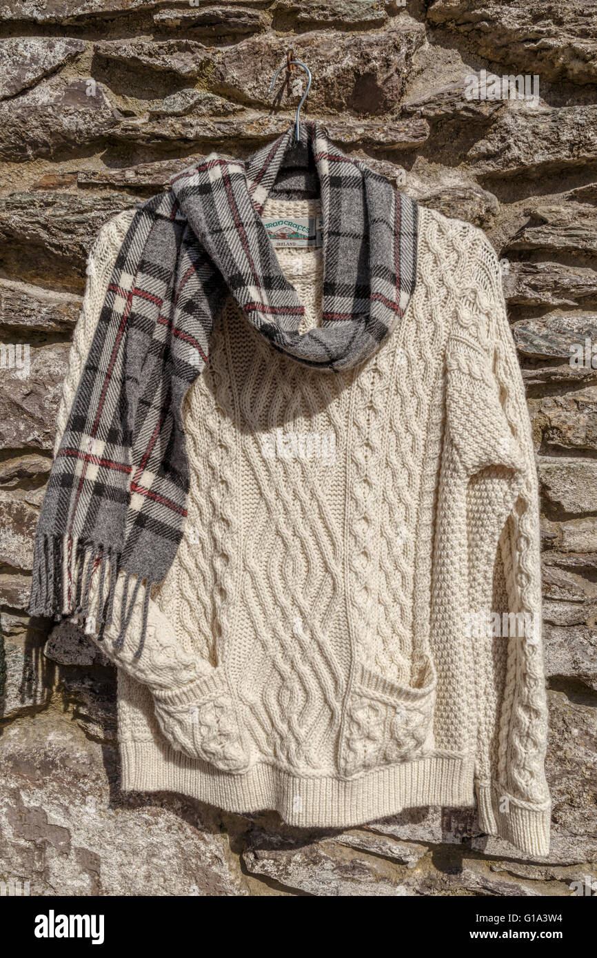 Irish knitwear and checked woolen scarf for sale at Molly Gallivan's Cottage & Traditional Farm, near Kenmare, Kerry, Ireland. Stock Photo