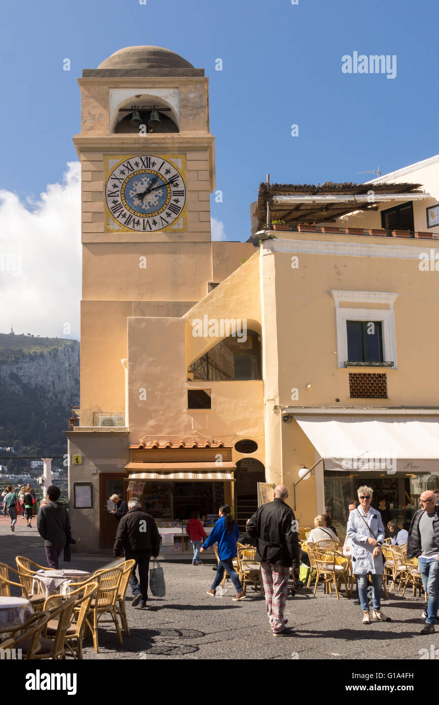 The famous clock tower on the Piazza Umberto I, or Piazzetta di Capri (meaning 'little square'), the heart of social life in Capri. Italy Stock Photo