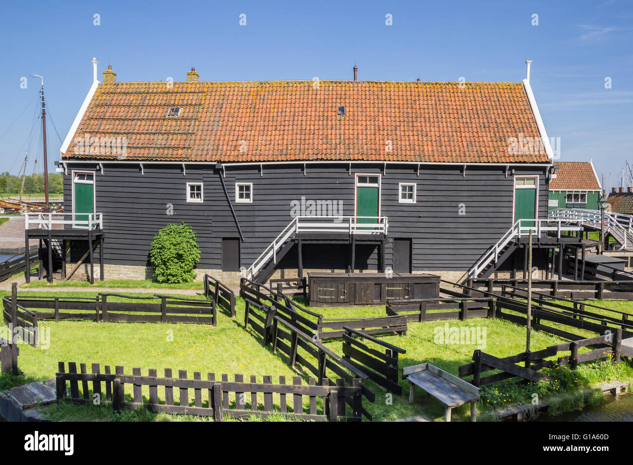 Wooden cottage at the lake in Enkhuizen, Holland Stock Photo