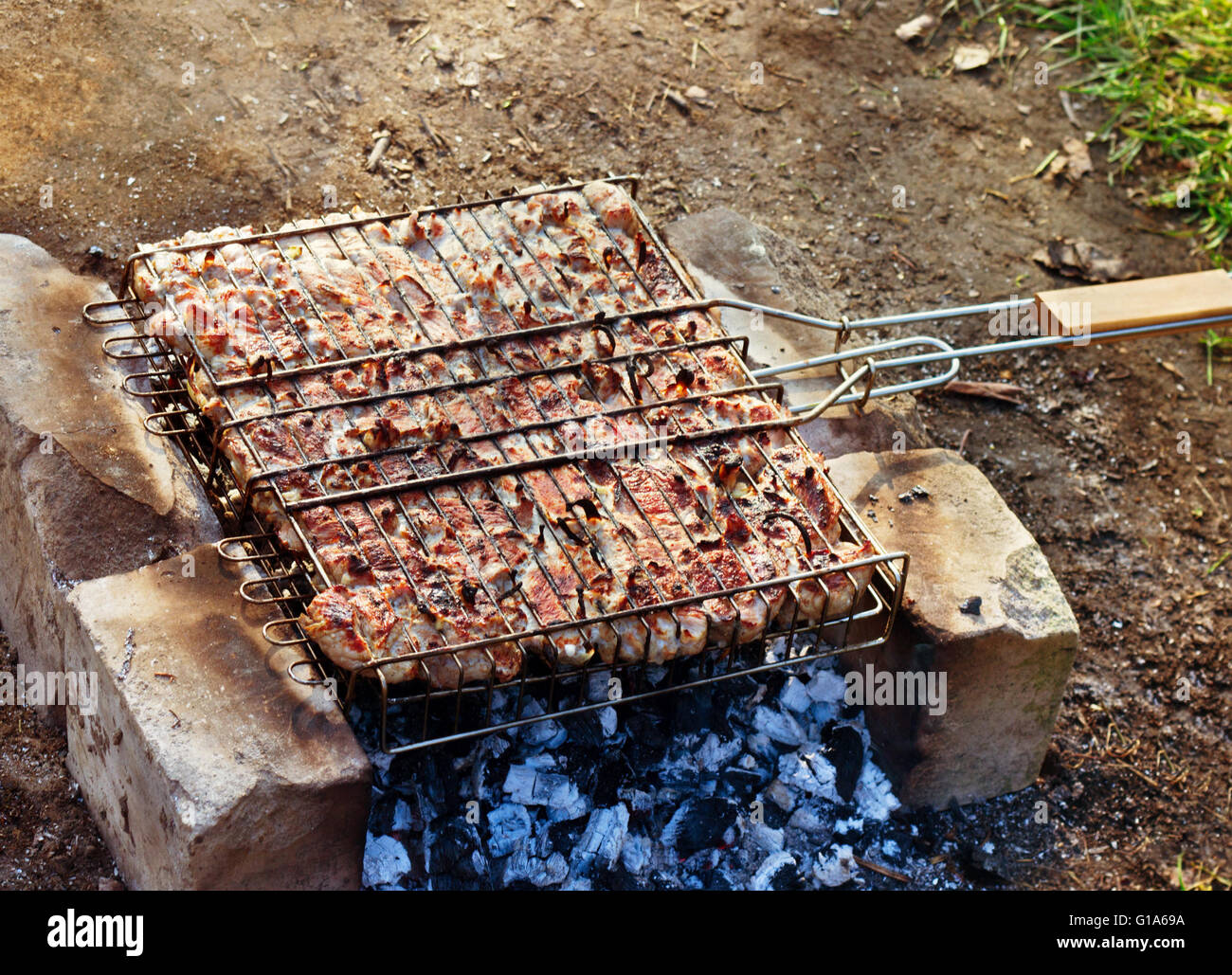 Meat, roasted over an open fire, barbecue Stock Photo Alamy