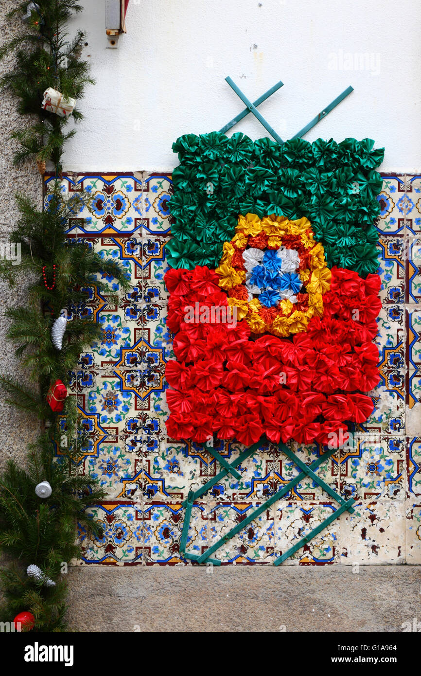 Portuguese flag made of plastic rosettes on ceramic tile wall, Vila Praia de Ancora, Minho Province, northern Portugal Stock Photo