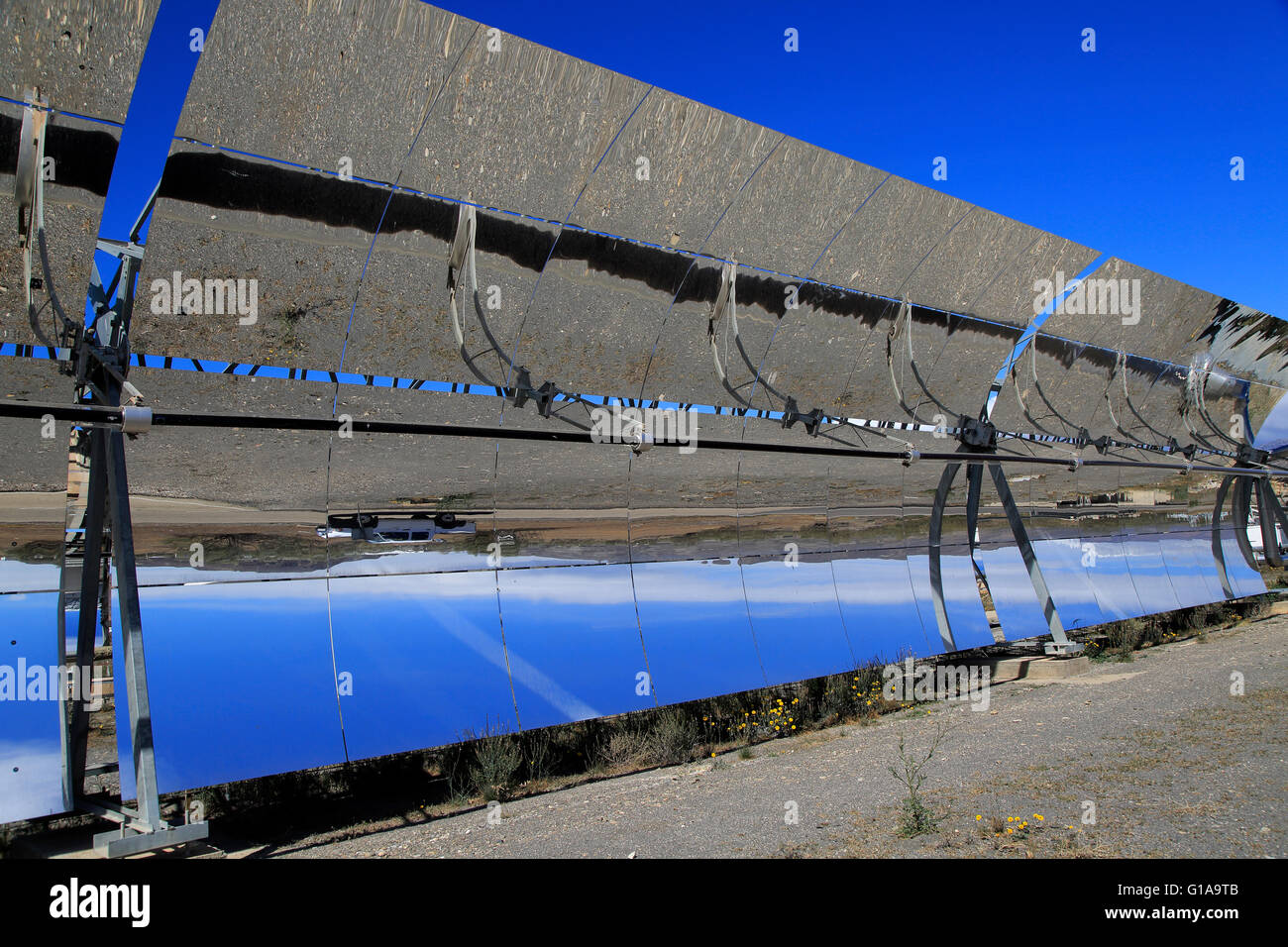 Curved concave reflector mirrors at the solar energy scientific research centre, Tabernas, Almeria, Spain Stock Photo