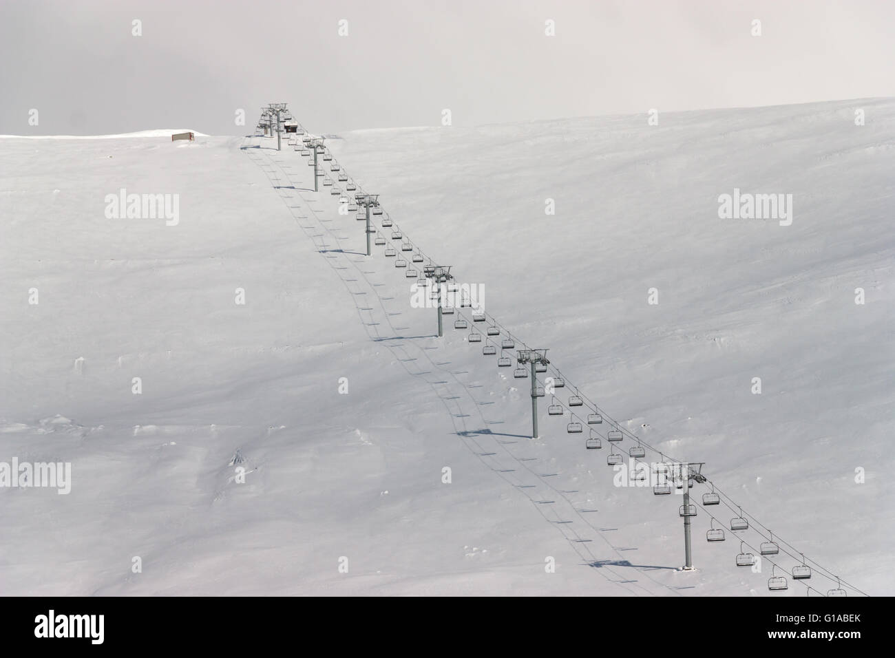 empty skilift in winter over the mountain in Ranca, Romania Stock Photo