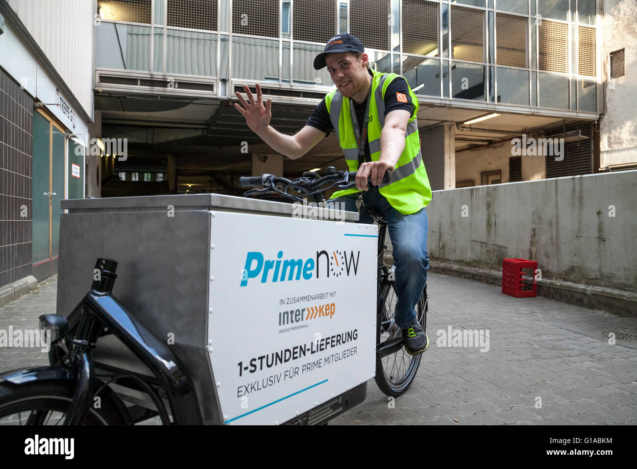 Courier of Amazon Prime Now in Berlin Germany Stock Photo