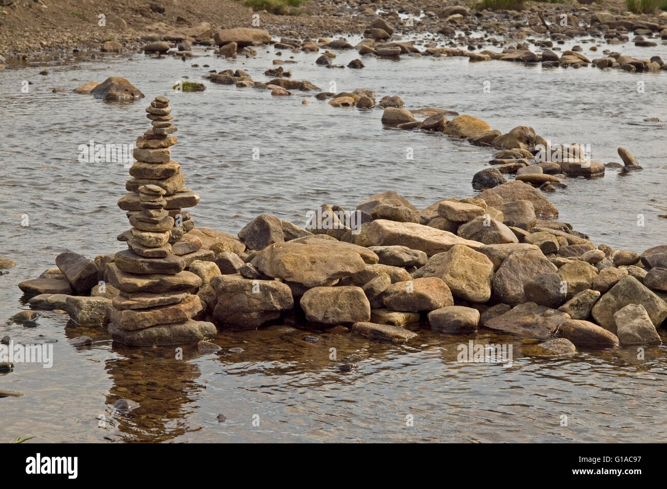 cairn river bed stream water Stock Photo