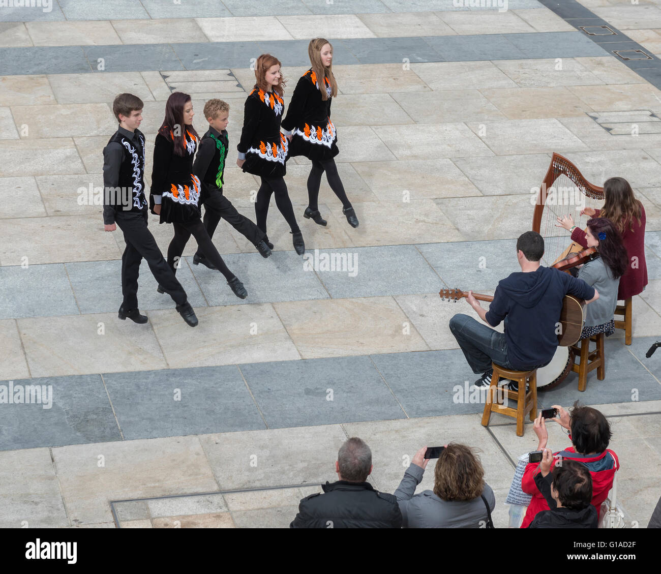 Irish dancers and musicians playing at Guildhall Square. Derry Londonderry, Northern Ireland, UK. Europe Stock Photo