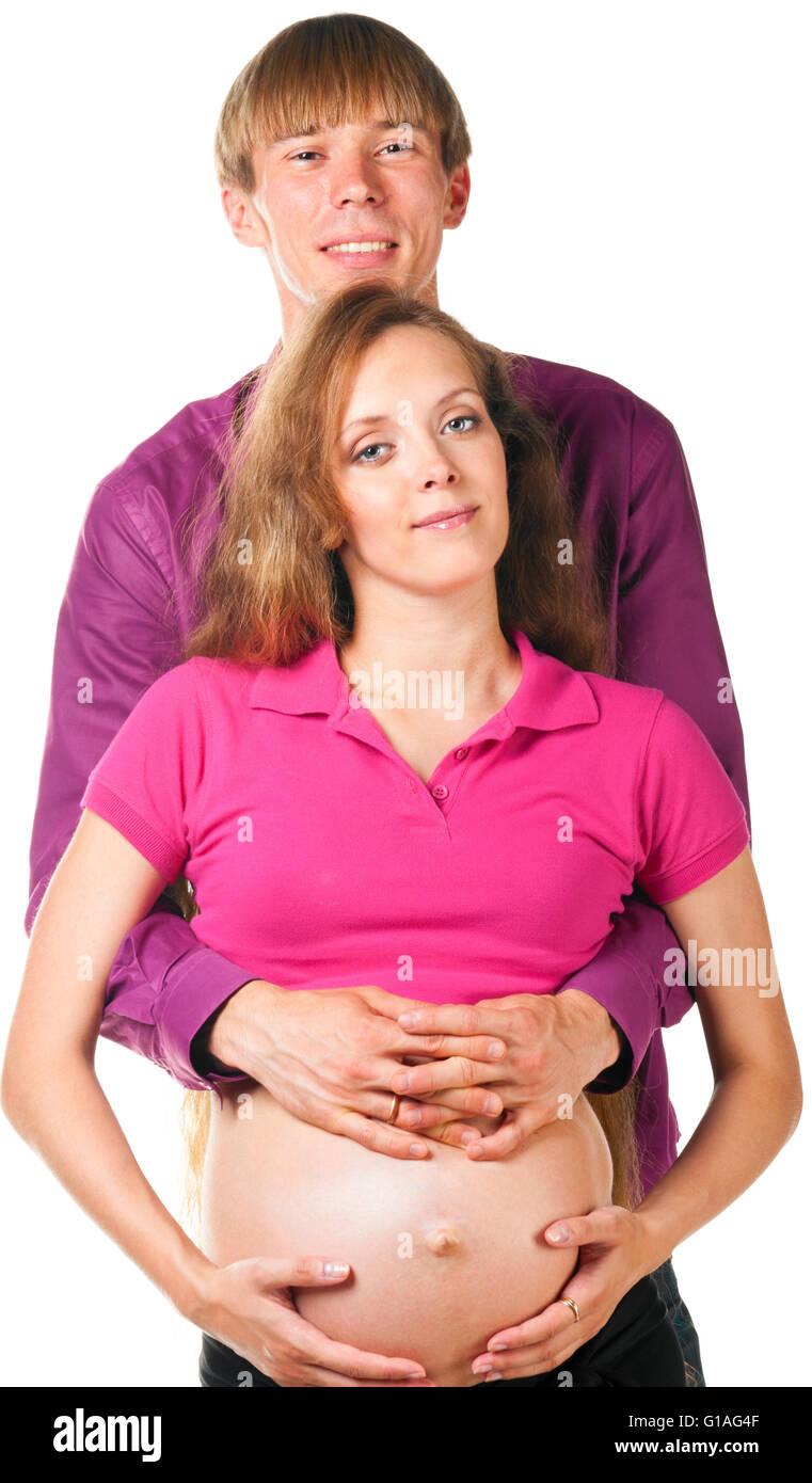 man is embracing pregnant woman Stock Photo - Alamy