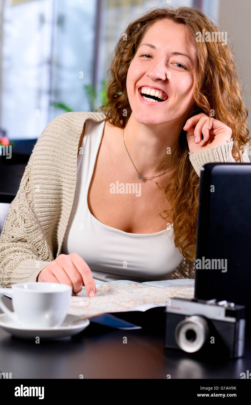 Beautiful woman planning trip hi-res stock photography and images - Alamy