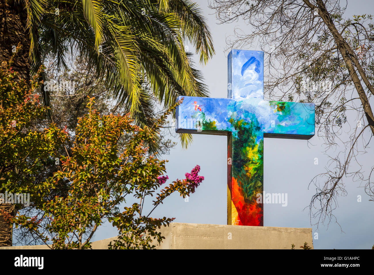 A colorful decorative cross at the Immaculate Conception Church on San Cristobal Hill in Santiago, Chile, South America. Stock Photo