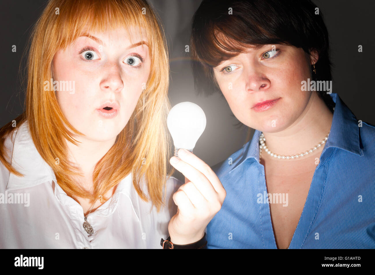 women with bulb Stock Photo