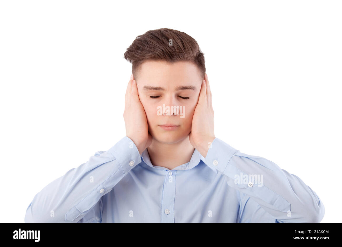 boy closing his ears with hands, isolated on white Stock Photo