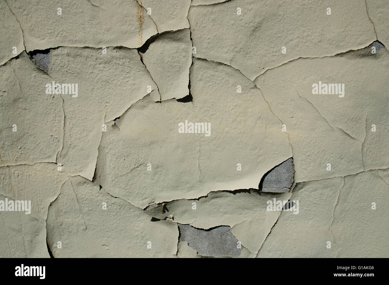 Paint peeling off a stone or concrete background, grunge texture Stock