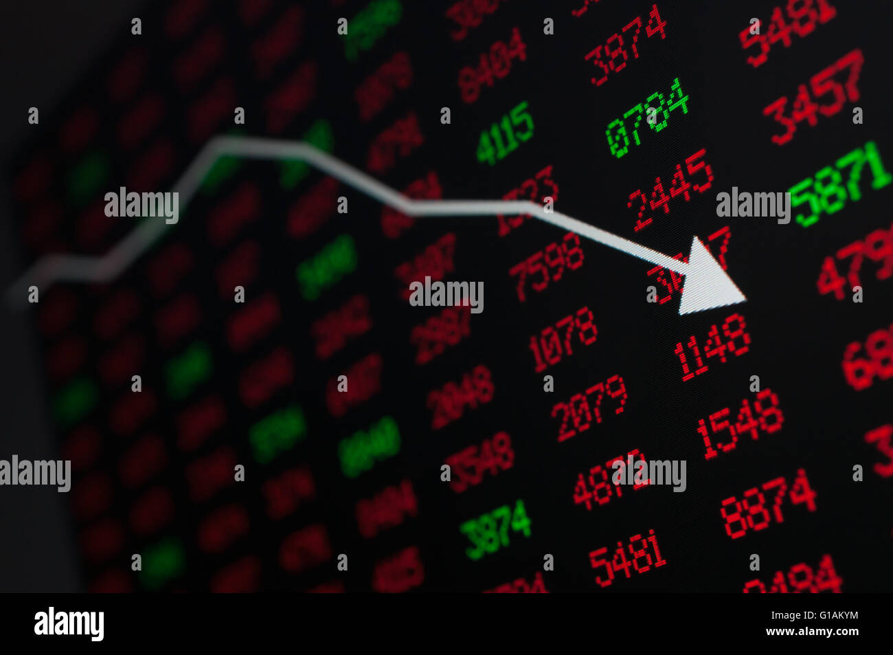 Stock Market Arrow Graph Going Down on Display With Red and Green
