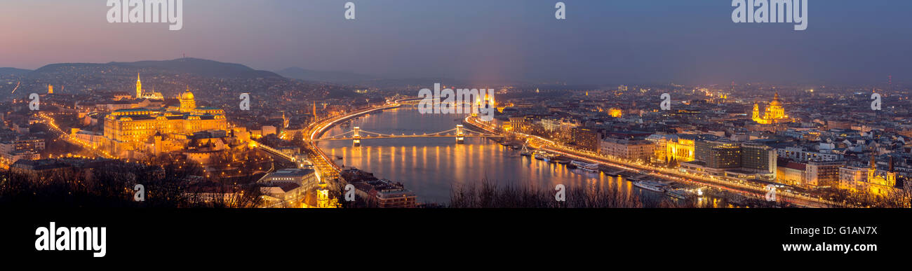 Panoramic cityscape of Budapest at night with Castle Hill, Chain Bridge, Parliament, Matthias Church and St Stephen's Basilica Stock Photo