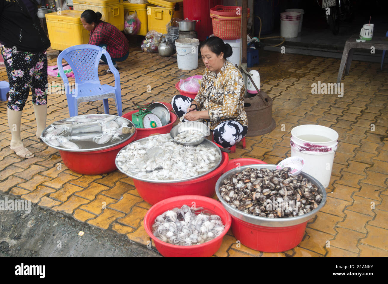 A seller at My Tho market, Vietnam Stock Photo